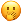 with hand over mouth